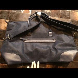 Weekender bag. Adjustable shoulder strap. NWOT.